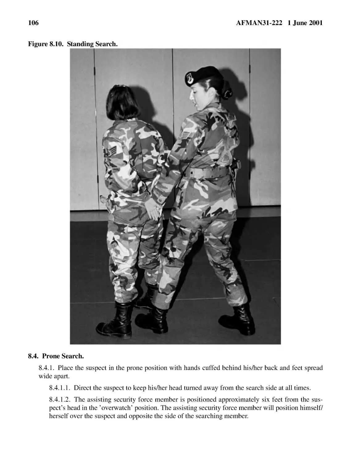 Figure 8.10.� Standing Search.
8.4.� Prone Search.
8.4.1.2.� The assisting security force member is positioned approximately six feet from the suspe...